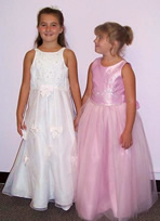 Two girls in flower girl dresses